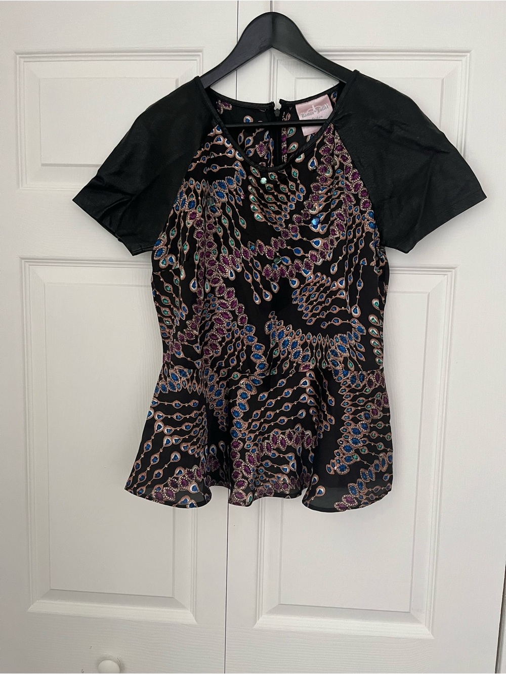 Romeo & Juliet Couture Black Peplum Top with Purple and Blue Accents